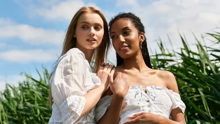 Portrait of a beautiful young woman with radiant skin and confident expression, showcasing effortless modern beauty and feminine charm